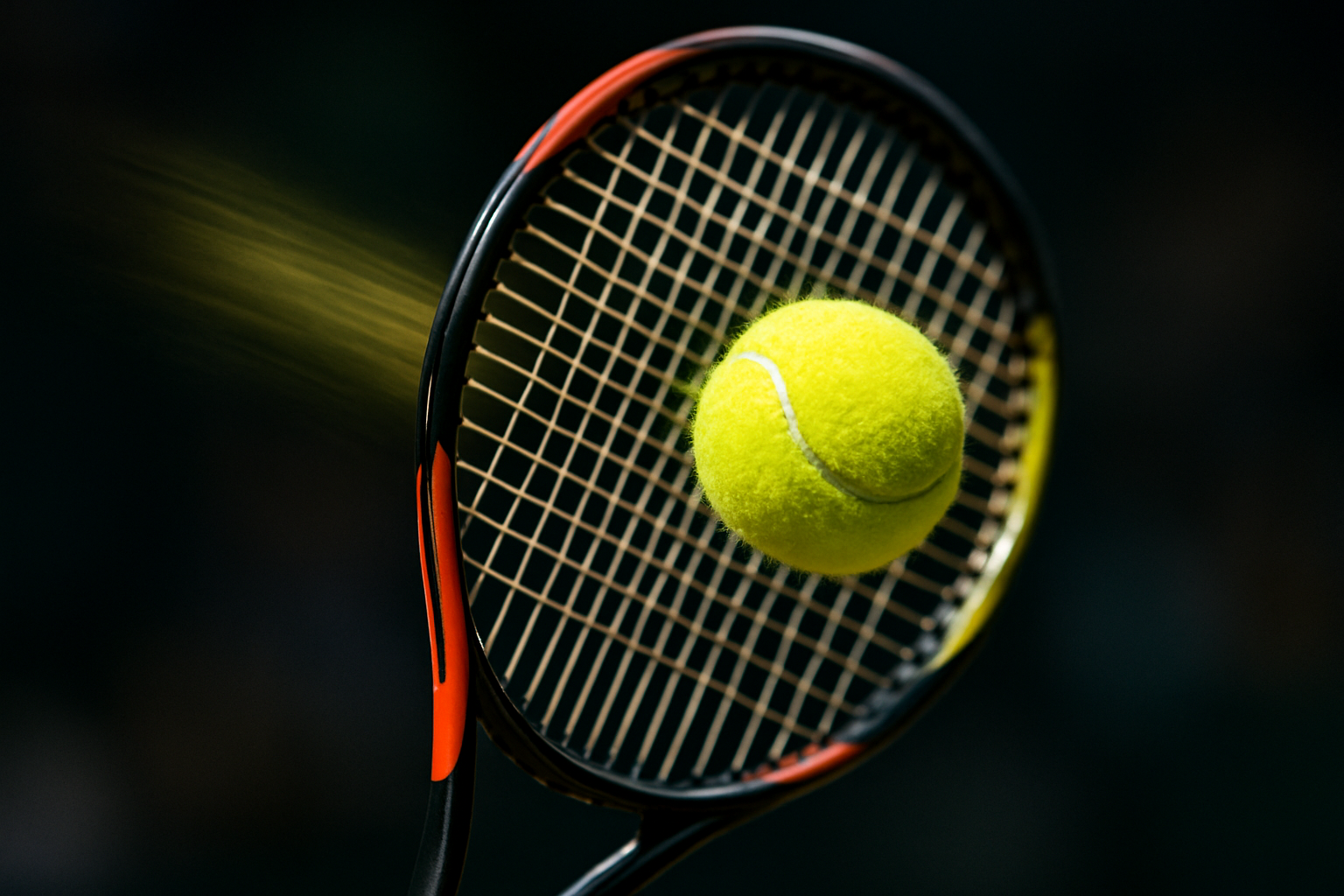 A TENNIS BALL BEING HIT BY A TENNIS RACKET
