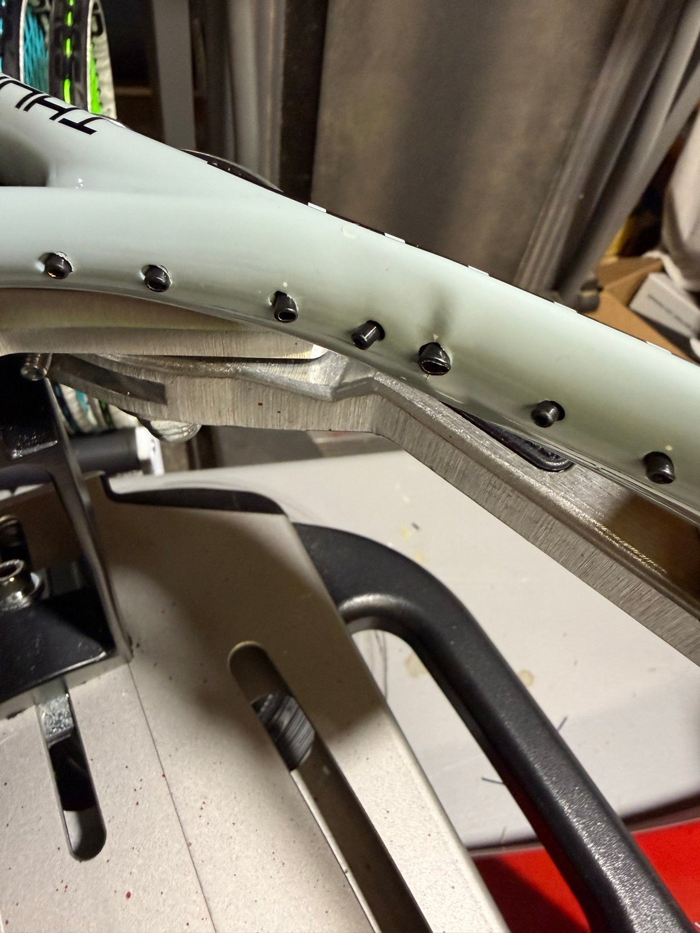 When Is a Tennis Racquet Not Worth Restringing?