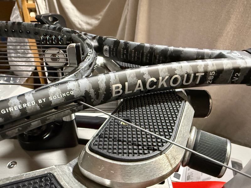 Solinco Blackout Racquet on the Stringing Machine.